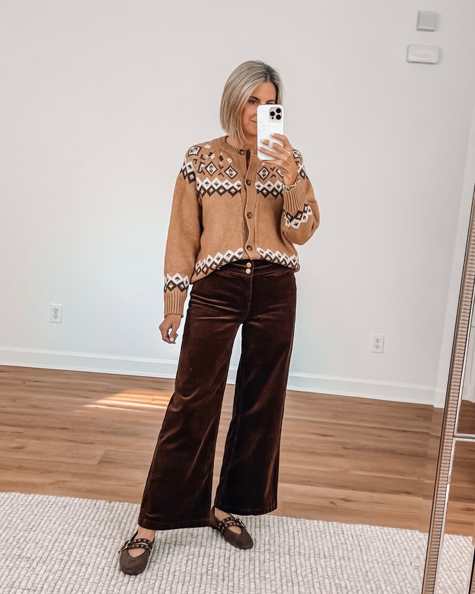Thanksgiving outfit idea - Fair isle cardigan sweater and brown corduroy wide leg pants. wearing xs in sweater, 4 in pants 

#LTKSeasonal #LTKFindsUnder50 #LTKOver40