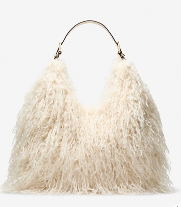 This faux fur handbag is definitely a must have. I’m loving this style!