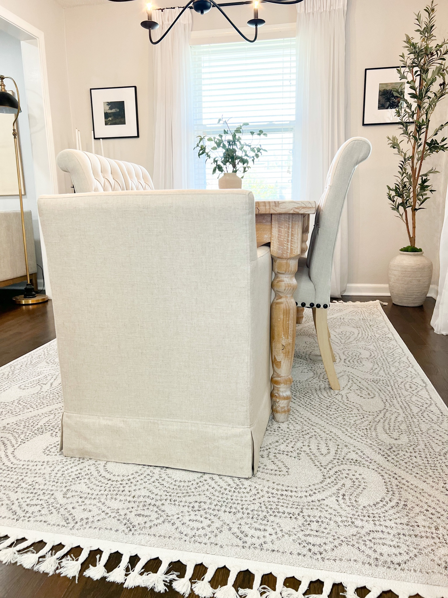 Dining room furniture including upholstered chairs, olive tree, rug, and a similar table #homedecor #ltkfind #competition 

#LTKstyletip #LTKhome #LTKFind