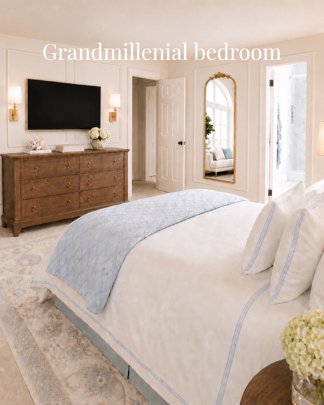 Here’s another view of what’s happening in the grandmillennial style bedroom. If you have a blank wall, consider hanging a beautiful full length mirror. It really complements the space with both beauty and function. 
Another easy fix is adding decorative peel n stick moulding tape to your TV frame! What an easy, inexpensive update! Round it out with wireless sconces, and you’ve created a lot of glam without a lot of money. 

#wayfair #amazon #walmart #bedroomdesign #

#LTKHome