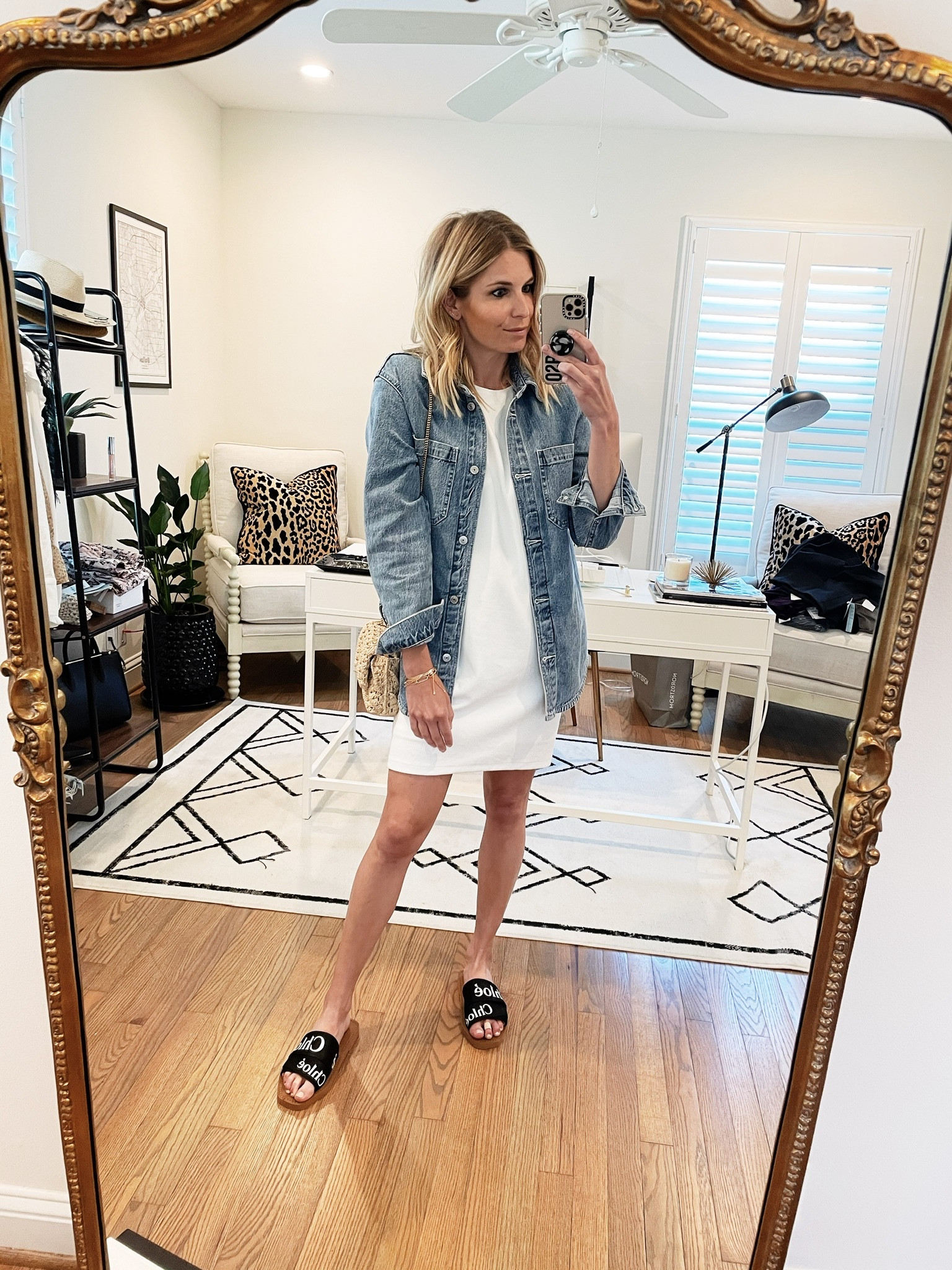 White t-shirt dress, denim shacket, YSL purse and Chloe sandals. 

#LTKunder100 #LTKstyletip #LTKFind