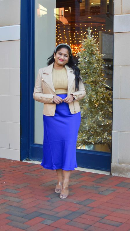 Winter chic outfit idea. @loft satin skirt in blue color, wearing size 
@madewell shimmer knit tank 
@blanknyc faux leather jacket 
@schutz heels 

#LTKmidsize #LTKfindsunder50 #LTKSeasonal