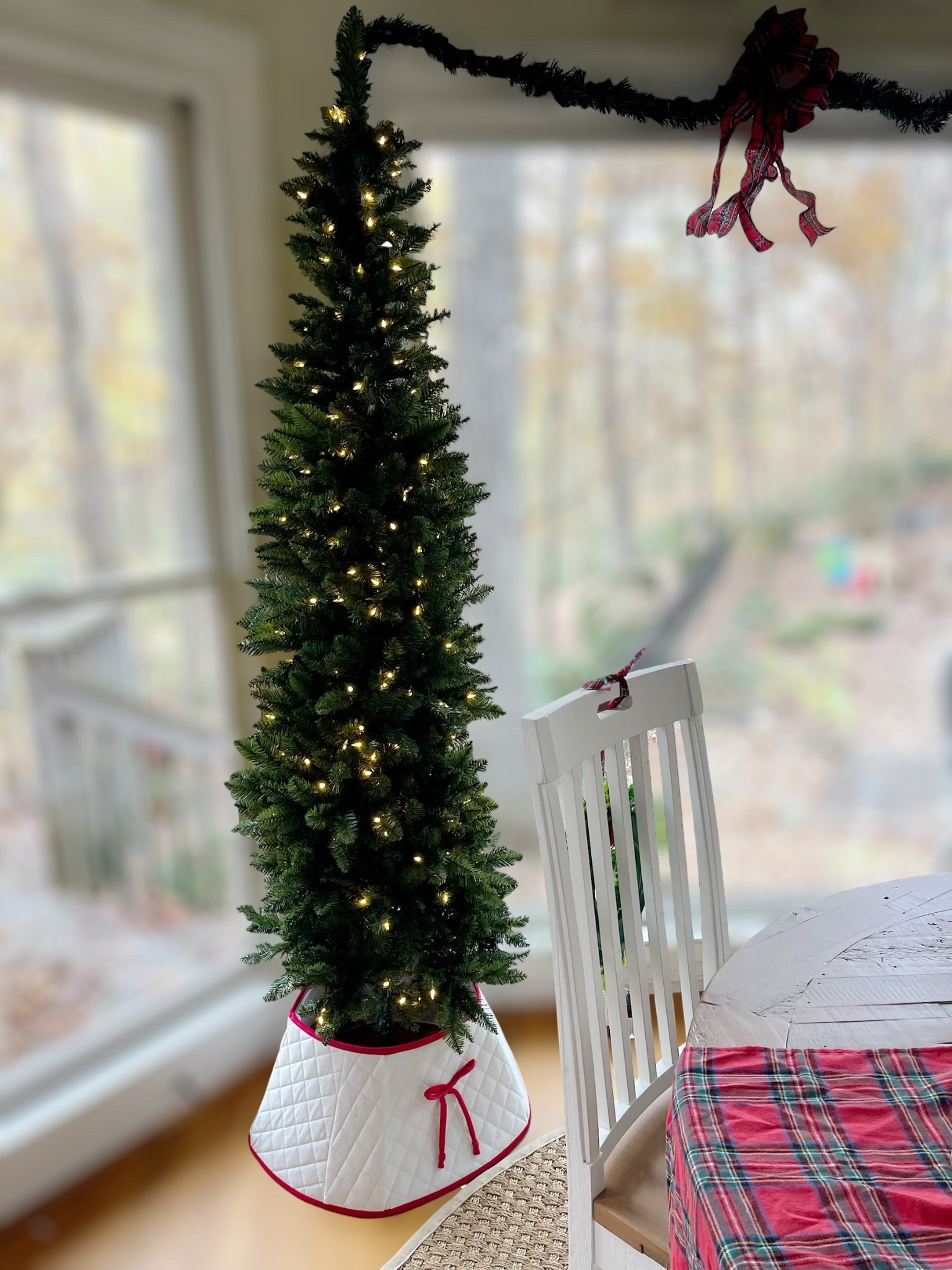 🎄 Slim Christmas Tree Kitchen Nook Decor ✨

This little cozy corner is officially holiday-ready! I added a slim pre-lit tree in our breakfast nook and dressed it up with this white quilted tree stand band and classic red tartan bow for the sweetest pop of Christmas charm. The slim shape is perfect for tight spaces, and the warm lights make the whole room feel magical. Paired with our reclaimed wood dining table, white slat-back chairs, natural jute rug, and holiday plaid tablecloth, this space feels festive without overwhelming the room. Simple, classic, and so easy to recreate! ❤️🎁🌲

Linked everything below:
– Quilted Christmas Tree Stand Band 🤍
– Red Tartan Plaid Bow 🎀
– Slim Pre-Lit Madison Pine Tree 🌲
– White Dining Chairs
– Round Reclaimed Wood Pedestal Table
– Natural Jute Rug
– Plaid Ribbon & Seasonal Greenery

At the bottom of your post, add your organic keywords paragraph (per your preference):

holiday kitchen decor • slim Christmas tree • breakfast nook Christmas • cozy holiday home • holiday decorating ideas • plaid Christmas decor • tartan bow decor • slim prelit tree • Walmart Christmas finds • Amazon holiday decor • festive kitchen nook • Christmas tree stand band • classic Christmas style 🌟

#LTKHoliday #LTKHome #LTKFindsUnder50
