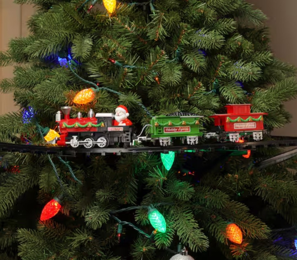 My favorite way to display my Christmas train is up in my tree. 

#LTKFindsUnder50 #LTKHoliday #LTKSeasonal