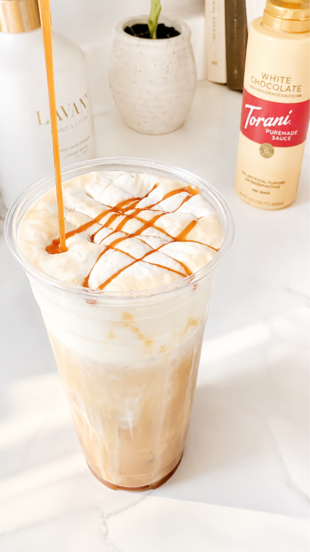 My current iced latte obsession ☁️🤎

• White chocolate sauce
• Fresh espresso
• Caramel lined cup
• Half & half
• Vanilla sweet cream cold foam
• Extra caramel drizzle

Tastes like a coffee shop drink without leaving the house ✨

#icedcoffee #icedlatte #coffeeathome #coffeetok #coffeelover