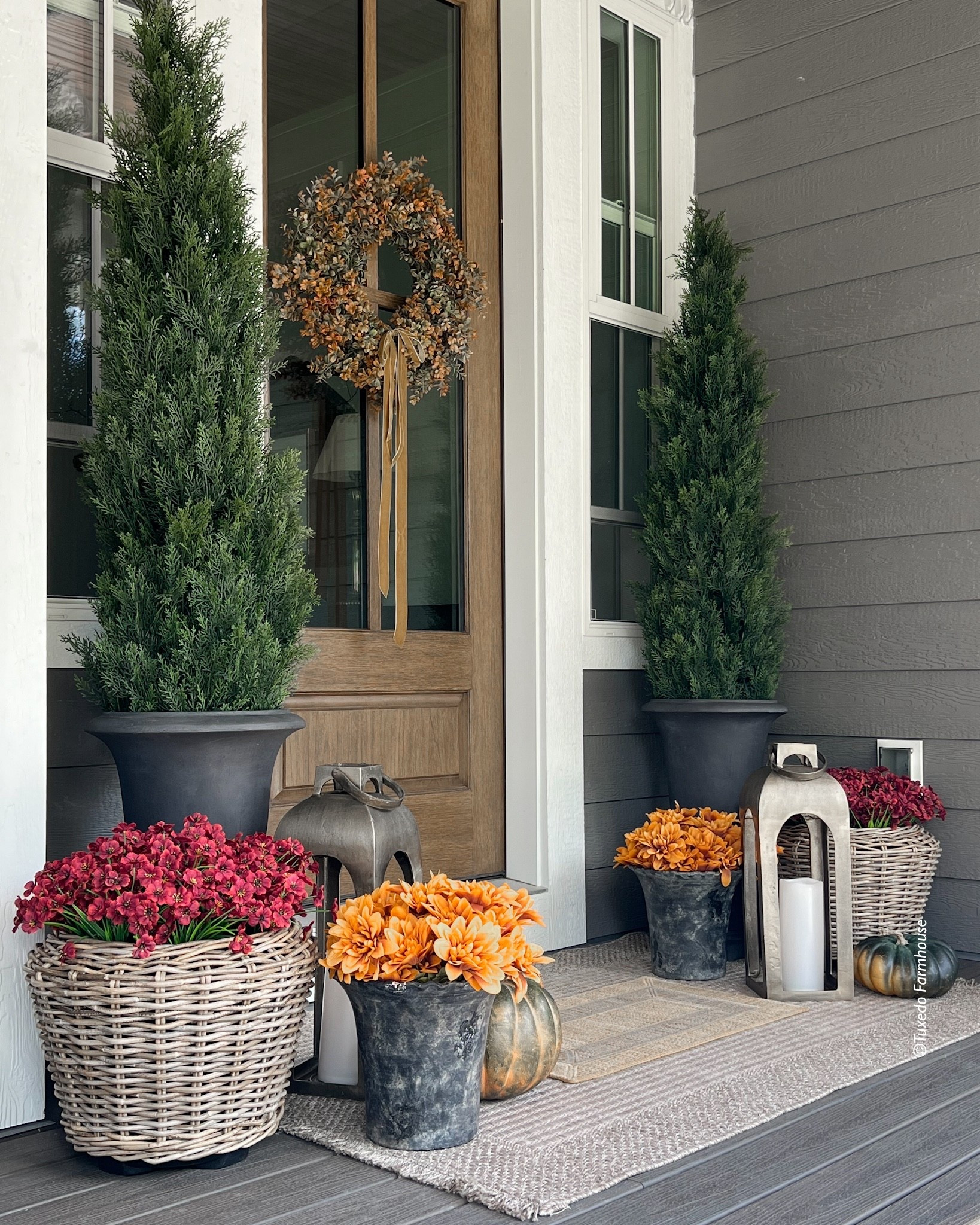 Fall has arrived on my porch. These faux mums look so realistic! I used two orders of each mum in each planter. My planters are size L.
I added gold velvet ribbon to the door wreath in 1-1/2 and 5/8 inch and linked what I used. 

#LTKHome #LTKFindsUnder50 #LTKSeasonal
