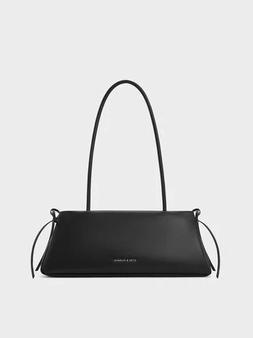 Hazel Bow Elongated Trapeze Shoulder Bag
    
         - Noir | Charles & Keith AU
