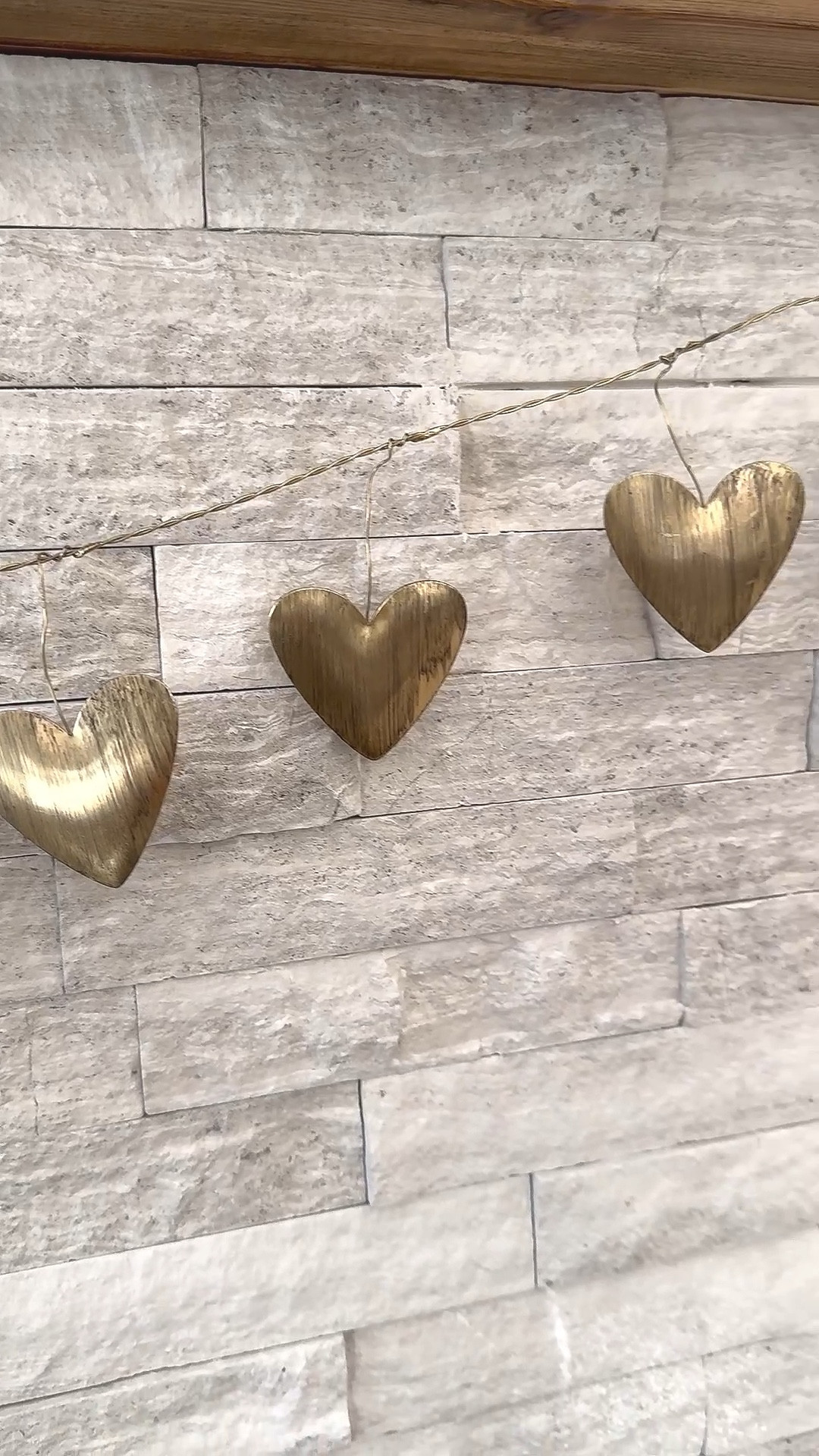 SELL OUT RISK | 
Will post a photo soon of mantle fully decorated. 
This gorgeous brass metal heart garland is giving effortless Valentine’s charm with a modern, elevated twist. The brushed brass hearts add just the right amount of warmth and shine, making it perfect for styling across a mantel, shelf, console table, or even draped over a headboard. It’s minimal, neutral, and timeless—easy to style for Valentine’s Day but subtle enough to leave up all year long. A simple decor piece that instantly makes your space feel cozy, romantic, and thoughtfully styled. I’m a big fan of mixed metals and simple neutral decor.
For reference: Garland is 72” long

brass heart garland • valentines heart garland • valentines decor • metal heart garland • valentines mantel decor • neutral valentines decor • target valentines decorations • modern valentines decor • farmhouse valentines decor • shelf decor valentines • brass home decor • heart garland Valentine’s Day

#ValentinesDecor #ValentinesDayDecor #TargetFinds #MixedMetalDecor #HeartDecor #NeutralDecor #ModernFarmhouseDecor #MinimalHome #HomeDecorInspo #SeasonalDecor #MantelDecor #ShelfStyling #CozyHome #AffordableDecor #ValentinesInspo

#LTKHome #LTKFindsUnder50 #LTKSeasonal