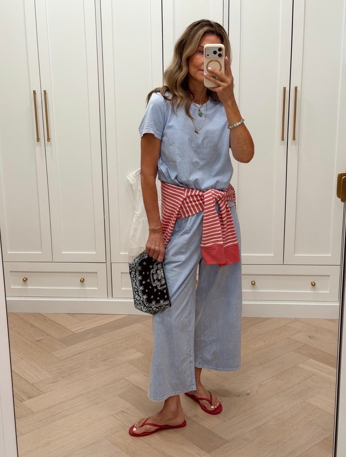 I’m 5’6’’.
-Such a pretty set! @Threads 4 Thought  wearing size S in the top and XS in bottoms
-bag is a summer favorite @Madewell 
-striped Crewneck TTS

#LTKootd #LTKOver40 #LTKSeasonal