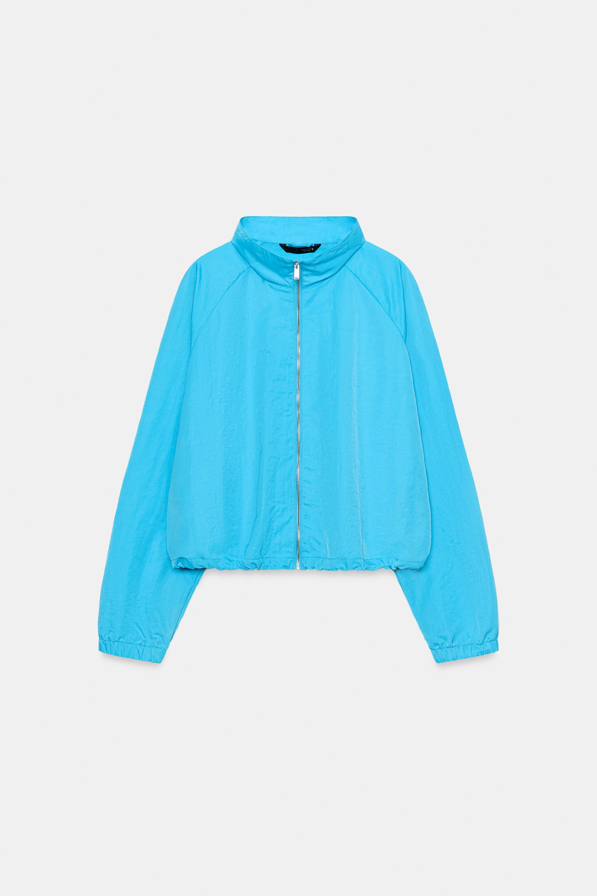 Jacket with a high collar and long raglan sleeves. Featuring an adjustable hem with an elastic dr... | Zara UK