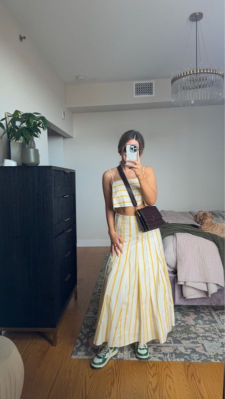 Bloomingdale’s vacation outfit. Yellow vacation set. Wearing a small in the top and bottom. I wish I would have sized down in the skirt bc it runs a little big. 
Dibs code: emerson (good life gold & strawberry summer)
Loving tan code:Emerson 
Electric picks code: emerson20

#LTKSeasonal #LTKstyletip #LTKtravel