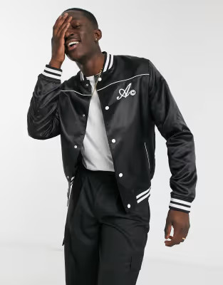 ASOS DESIGN – Jacke in Schwarz im College-Stil mit Markendesign | ASOS (Global)