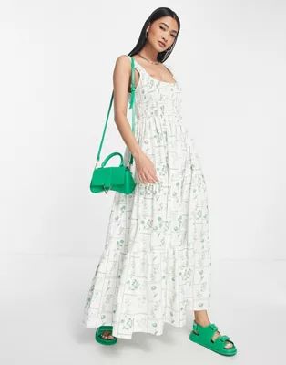 ASOS DESIGN shirred maxi sundress with tiers in green floral print | ASOS (Global)