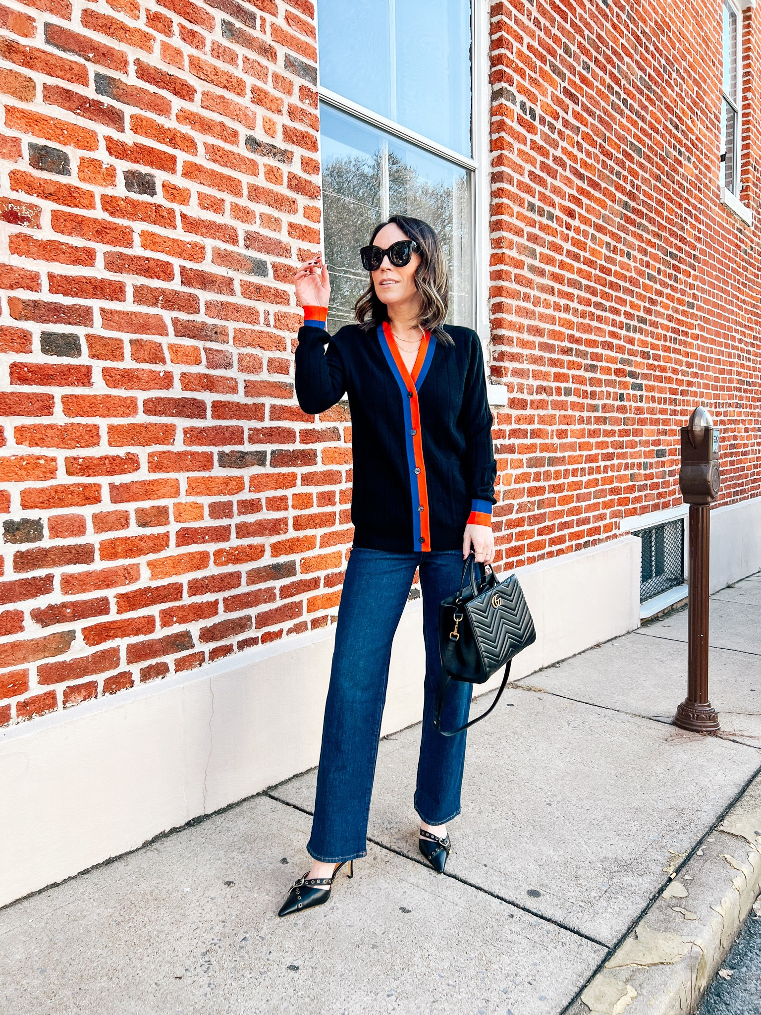 Wearing a long varsity style cardigan with my Madewell wide leg jeans 

#LTKstyletip #LTKover40