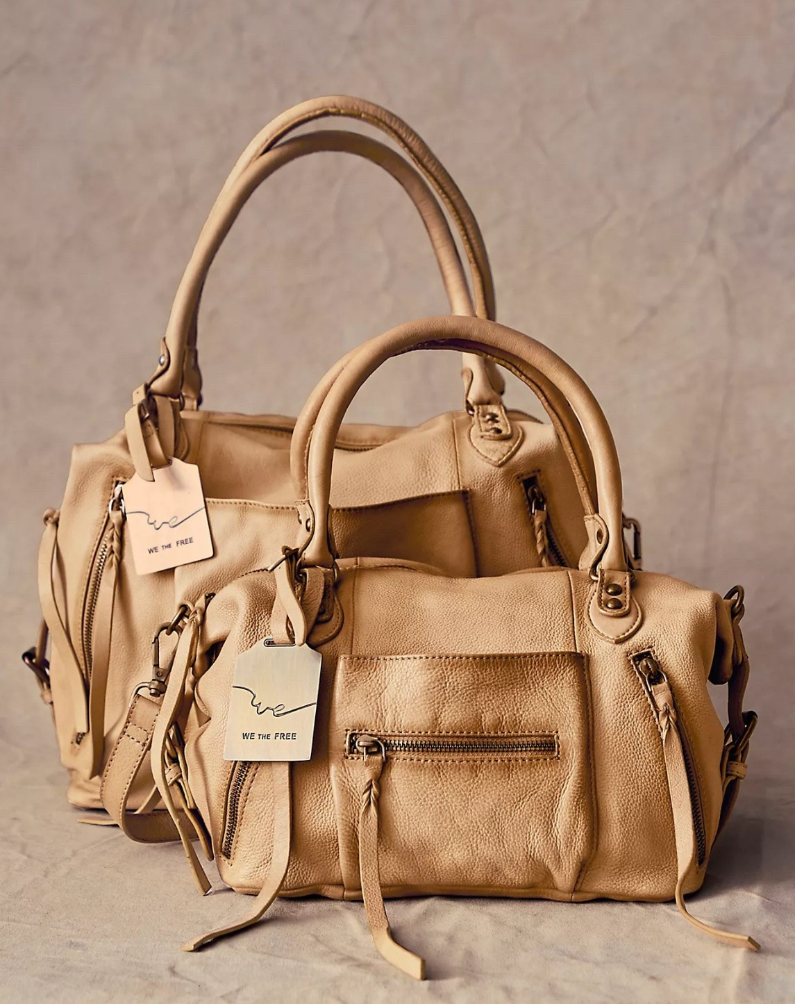 The viral Emerson tote is here
We The Free Emerson Tote Bag comes in 9 colors and in baby size. 
An affordable high quality version of a designer dupe bag.