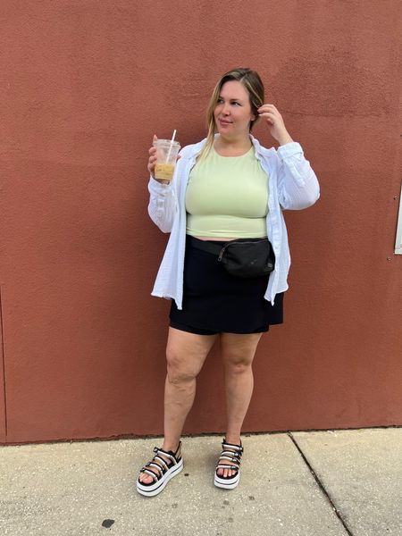 Plus Size OOTD Beach Edition! Wearing a Target skort from last year (linked similar), my trusty Old Navy PowerChill Tank Bra + CAKES nipple covers (use code ASHLEYD10 for a discount), Nike platform sandals, Aerie oversized button up, and Amazon belt bag! 

#LTKcurves #LTKSeasonal #LTKstyletip