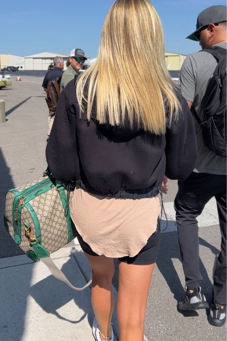 Airport bag details - this gorgeous Gucci Python Trim Duffle Bag 💚 I linked a similar colored duffel bag as well. 

travel l duffel bag l duffel l luggage l gucci bag l gucci duffel 
