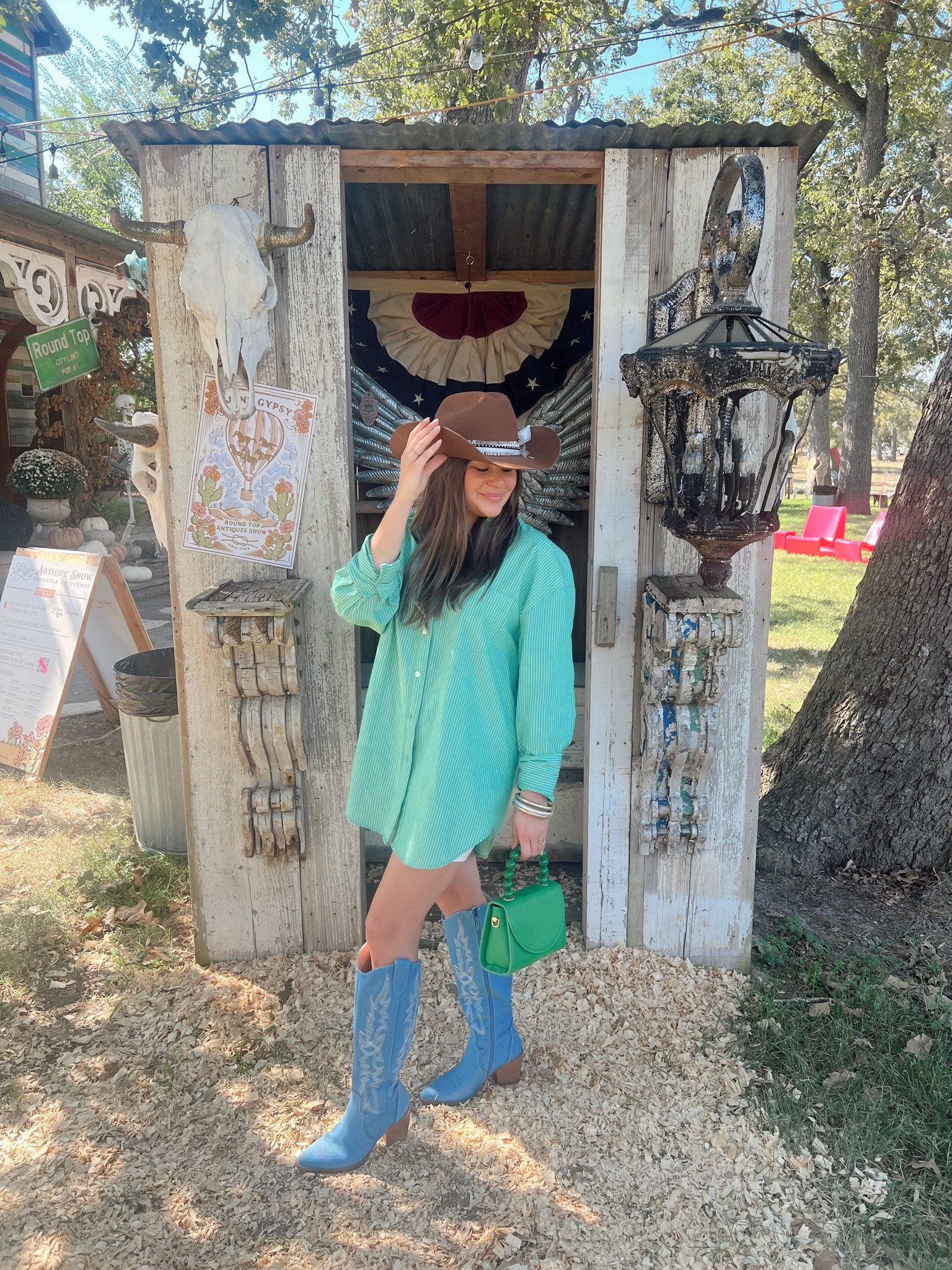 A girls trip to round top Texas for the antique fair! Shirt is Zara code 3666/165

Western attire, western inspired attire, blue boots, blue cowgirl boots, blue cowboy boots, denim boots, green purse, olga berg, brown western hat, green button down dress, green pinstripe dress, oversized poplin shirt, Zara, chocolate Stetson, 

#LTKStyleTip #LTKItBag