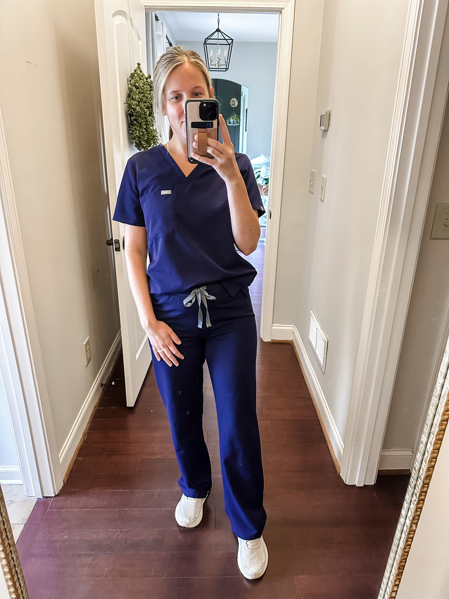 My favorite figs scrub combo!! High wasted pant and one pocket top. As always wearing my hokas for a long day! Wearing a small in top and bottoms  

#LTKStyleTip #LTKFindsUnder50 #LTKWorkwear