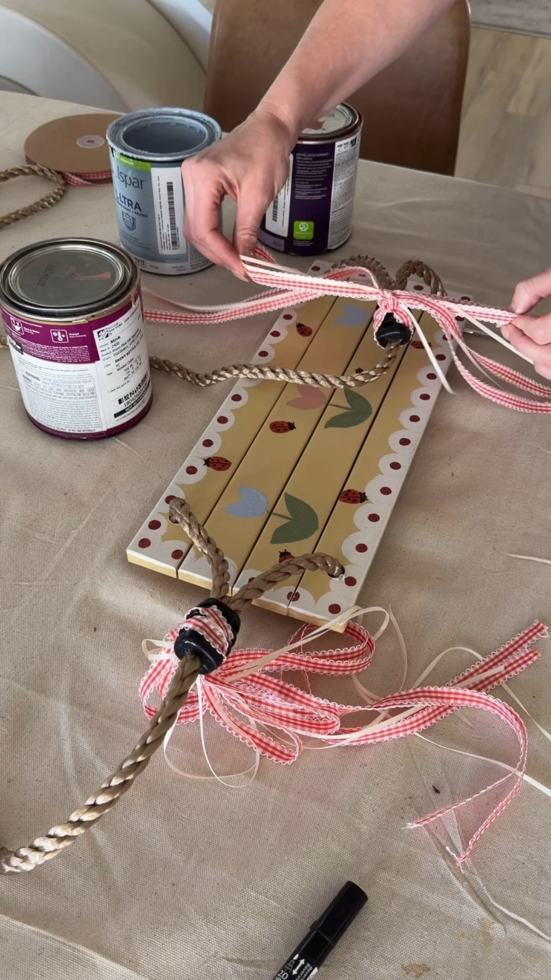 For the paint, I just used Behr paint that we already had from other projects! Ideally, you would use outdoor paint so that it holds up best :) Once I had mine painted, I sealed it with a topcoat! ￼

A little sunshine, a little paint, and a whole lot of magic 💛🐞

This is such an easy DIY for anyone who is looking to do something fun for their kids this summer!

You can paint a wooden swing and use it as a tree swing or you can use it on a regular swing set!

It’s the kind of childhood you wish you could bottle up 🌞🌼

#craftymom 

#LTKmomlife #LTKKids #LTKBaby