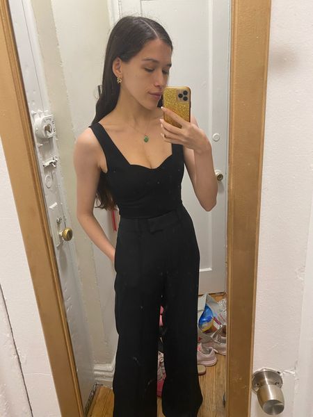 I have been LIVING in this Lovers and Friends bodysuit! It’s super comfortable, and made of a thick knit.

The bodysuit is a perfect piece for dressing down with jeans or dressing up with a skirt for date night. I paired it with these black high waisted trousers layered with a cardigan for work!

I’m 5’6” and wearing an XS in the bodysuit and XXS in the pants. The pants run big and longgggg. I had to hem mine, even when wearing 3.5” heels! 

Expect to tailor the black high waisted trousers unless you’re 5’10” and also wearing tall heels. It’s worth it—these pants are slightly stretchy and really comfortable. The perfect workwear piece!

Black bodysuit, corset bodysuit, high waisted pants, workwear inspo, what to wear to the office, all black outfit, REVOLVE finds

#LTKstyletip #LTKworkwear #LTKfindsunder100