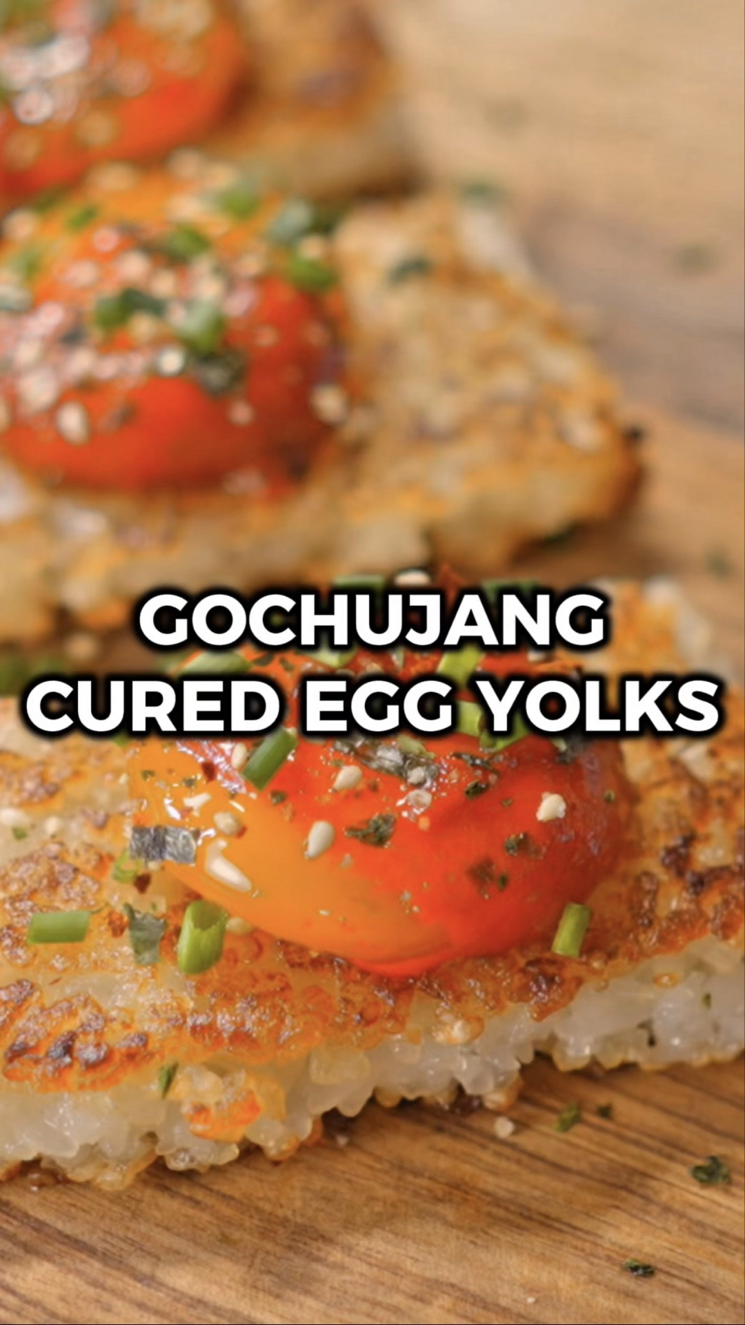 Gochujang cured egg yolks with crispy rice might be the tastiest (and easiest!) thing I've made in a long time! Like, ridiculously easy 😋

Big ups to @alexbrady._ on IG for the idea to cure egg yolks in gochujang! He’s the originator and has lots of awesome food content, so please go check him out! 🙌

We’re talking DEEP umami with just the right amount of heat from the gochujang, all sitting on top of crispy sushi rice cakes. Perfect for a spring or summer spread when you want to look like you tried really hard but actually didn't 😆

Would you try it? Let me know in the comments what you think if you do! 🙌

INGREDIENTS
4 egg yolks
Gochujang (enough to cover yolks)
2 instant rice cups (14 oz cooked white rice)
2 tbsp rice vinegar
2 tbsp granulated sugar
Vegetable oil (for frying)
Furikake (optional; to taste)
Chives (optional; chopped; to taste)
Gochugaru (optional; to taste)

INSTRUCTIONS
1️⃣ Spread a thin layer of gochujang across the bottom of a small container (around 6x6 inches) and press four small divots into it with a spoon.
2️⃣ Separate the yolks from the whites and gently nestle one yolk into each divot.
3️⃣ Fill a piping bag with gochujang and pipe it carefully over each yolk for more control so you don't break them.
4️⃣ Cover and refrigerate for 24 hours.
5️⃣ Cook the rice per package directions, then stir in the rice vinegar and sugar until combined to make sushi rice.
6️⃣ Line an 8x8 pan with parchment paper and press the rice into an even layer. For a thicker base, fold the layer in half. Freeze for 1 hour.
7️⃣ Cut the chilled rice into 4 pieces. Heat a thin layer of oil in a pan over medium heat and fry each square until golden and crispy on both sides, about 1-3 minutes per side.
8️⃣ Gently lift each cured yolk out of the gochujang and set one on top of each crispy rice square. Top with furikake, chives, and gochugaru if you like.
9️⃣ Enjoy!