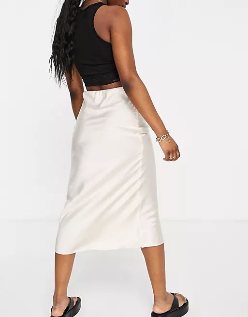 ASOS DESIGN satin bias slip midi skirt in off white | ASOS (Global)