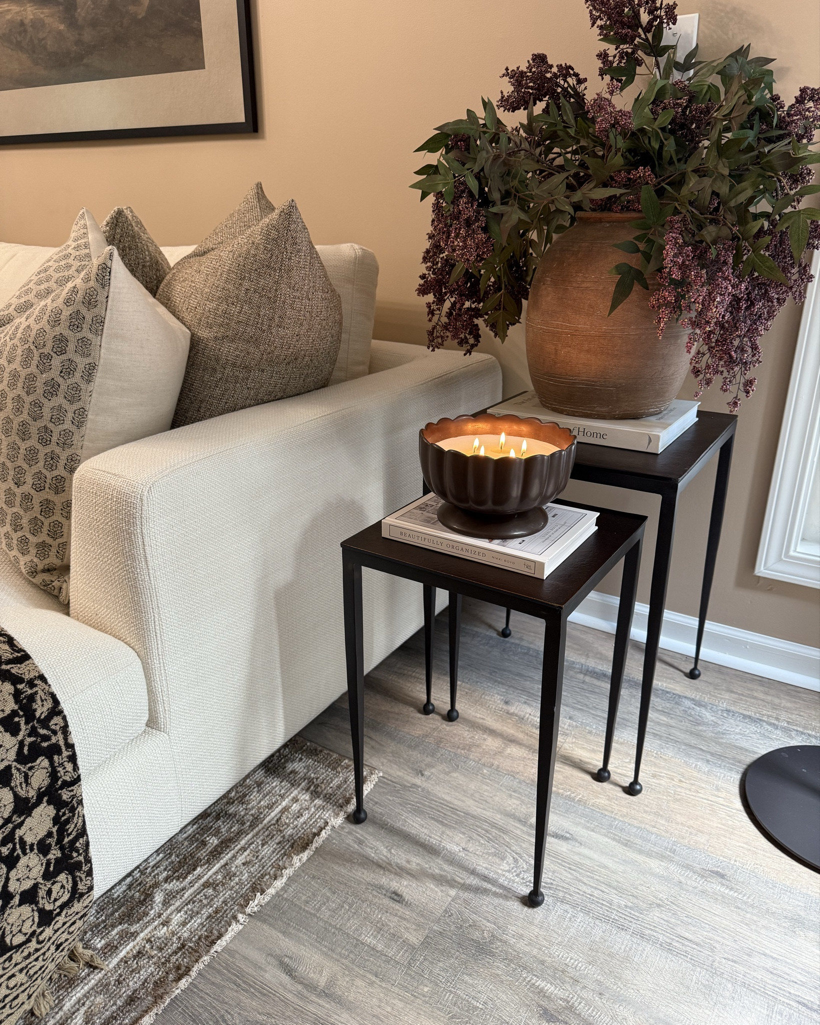 The Perfect Layering Piece
Follow @farmtotablecreations on Instagram for more home styling ideas.

These metal nesting tables are such a versatile win—slender tapered legs, rounded feet, and rust-finished tops that add just the right amount of charm. Styled here with a large vase filled with fall stems, a glowing candle, and layered next to the fireplace for that cozy corner moment. Whether stacked or split, they’re functional & timeless  

#nestingtables #cornerdecor #floorlamp #largevase #fallstems #fallhomedecor #falldecorideas #cozyfallvibes #falllivingroom #autumndecor #neutralfalldecor #pumpkindecor #cozyhome

#LTKHome #LTKSaleAlert #LTKFindsUnder50