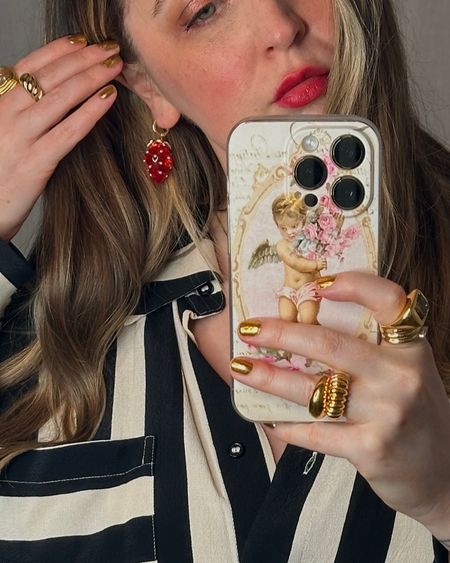 UP CLOSE | Strawberry earrings are the perfect little addition to your summer wardrobe 🍓🍓
Fruit motif | Stripe outfit | Red lipstick | Statement earring | Oversized jewellery | cocktail ring 

#LTKsummer #LTKuk #LTKspring