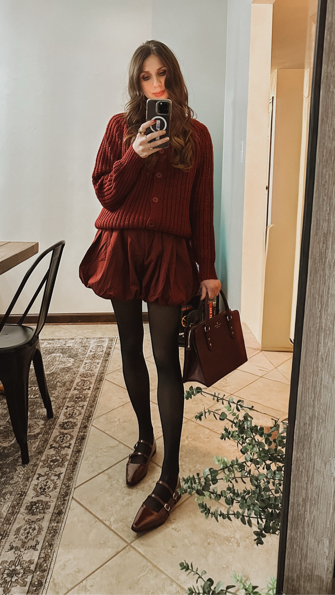 Having a burgundy moment this holiday season 🍷 

There’s just something about deep, rich tones that feel instantly festive. I paired this cozy burgundy cardigan with bubble shorts, classic black tights, Mary Janes, and a matching handbag for the perfect mix of chic and playful. (This Kate Spade bag is from a few seasons ago, so I will link similar options here)

Perfect for holiday parties, date nights, or festive gatherings — this burgundy outfit idea combines timeless charm with a modern twist.

#HolidayStyle #LTKfashion #WinterOutfitInspo #BurgundyAesthetic #LTKholiday #FestiveStyle

#LTKStyleTip #LTKHoliday #LTKootd
