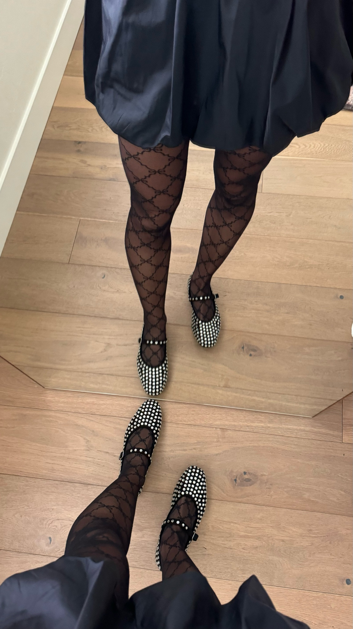 Budget friendly🖤🖤🖤 
The prettiest little tights, Maryjane flats and bubble skirt.
Skirt runs big, I sized down to a small 

#LTKSeasonal #LTKParties #LTKFindsUnder50