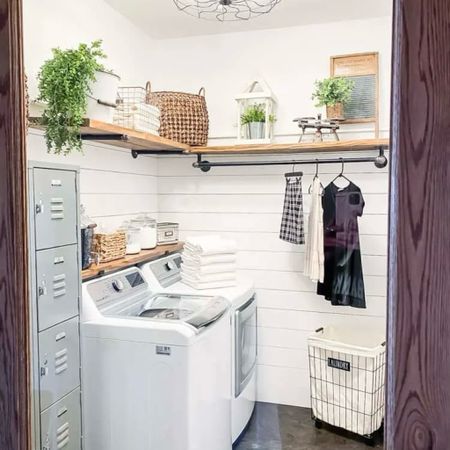 DIY your way to a beautiful farmhouse-style laundry room with some affordable upgrades including wood and pipe shelving, schoolhouse lockers, industrial lighting, baskets for storage, and farmhouse decor. 

#LTKhome #LTKstyletip #LTKfindsunder100