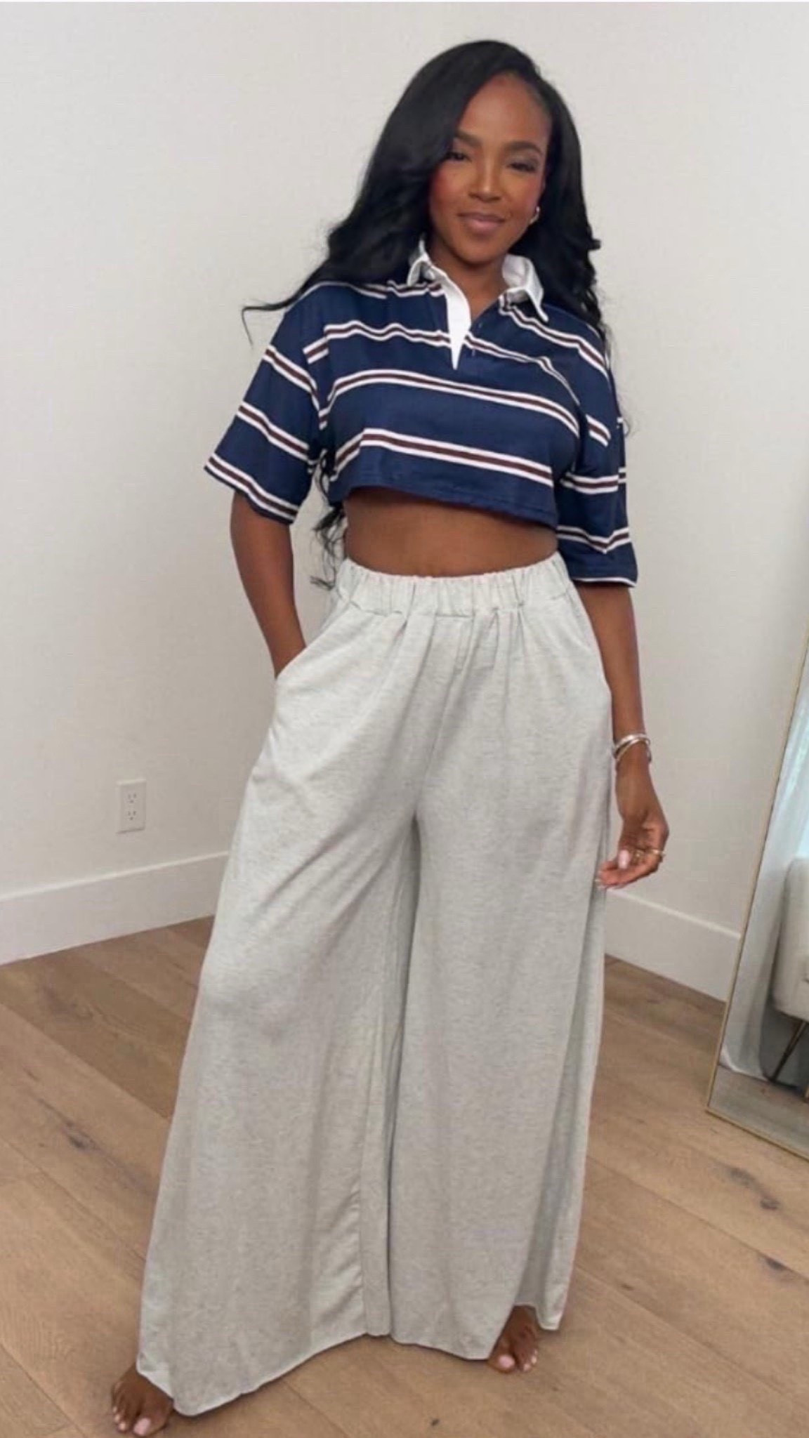 Easy, relaxed, and still pulled together — this is the kind of casual look I live in lately.

The cropped polo gives this outfit a sporty, effortless feel while the wide-leg lounge pants keep it comfortable and flattering. It’s the perfect balance of laid-back and styled, especially for days when comfort is non-negotiable but you still want to look cute.

Perfect for working from home, casual errands, lounging, travel days, or relaxed weekends.

📏 Fit + Details:
• Cropped striped polo — relaxed fit, lightweight, breathable  
• Wide-leg lounge pants — soft, flowy, elastic waistband, very comfortable  
• Easy pieces that mix and match endlessly, so cost per wear stays low  

📏 Sizing: Size Small  
📏 Measurements: 5’4” · 138 lbs · 34D · 27” waist · 40” hips  

Casual lounge outfits, elevated loungewear, wide leg pants outfit, comfy everyday style, relaxed chic looks, work from home outfits.

Follow me on Instagram and YouTube @kirasfashionfinds

#LTKgrwm #LTKootd