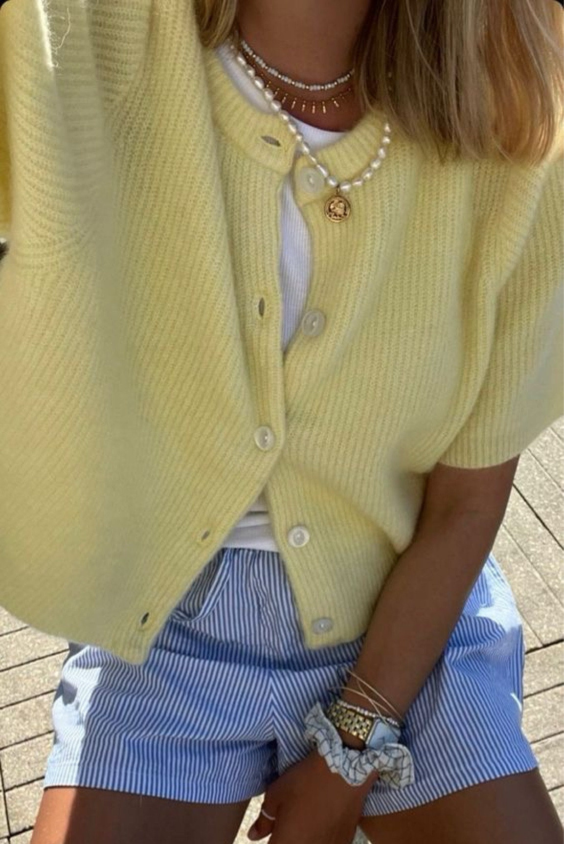 Your next casual beach day outfit 🏖️🌊

Featuring a butter yellow short sleeve cardigan, white tank, blue striped shorts, pearl and gold jewelry. You’ll be the belle of the Hamptons. 

pic via Pinterestt


#LTKSwim #LTKStyleTip #LTKActive