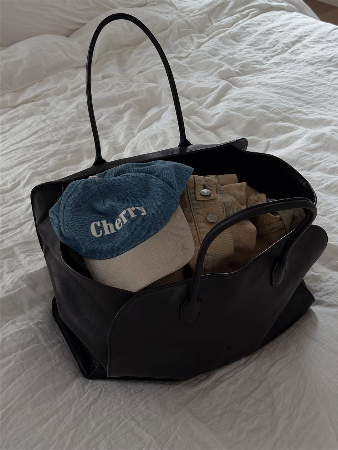 This tote holds absolutely everything I need! 🖤

#LTKItBag #LTKStyleTip