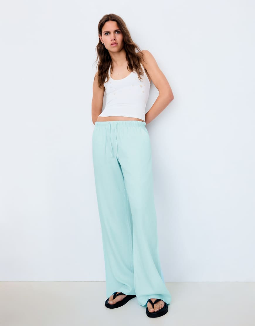Bershka Linen blend trousers with an elasticated waistband in blue | ASOS (Global)