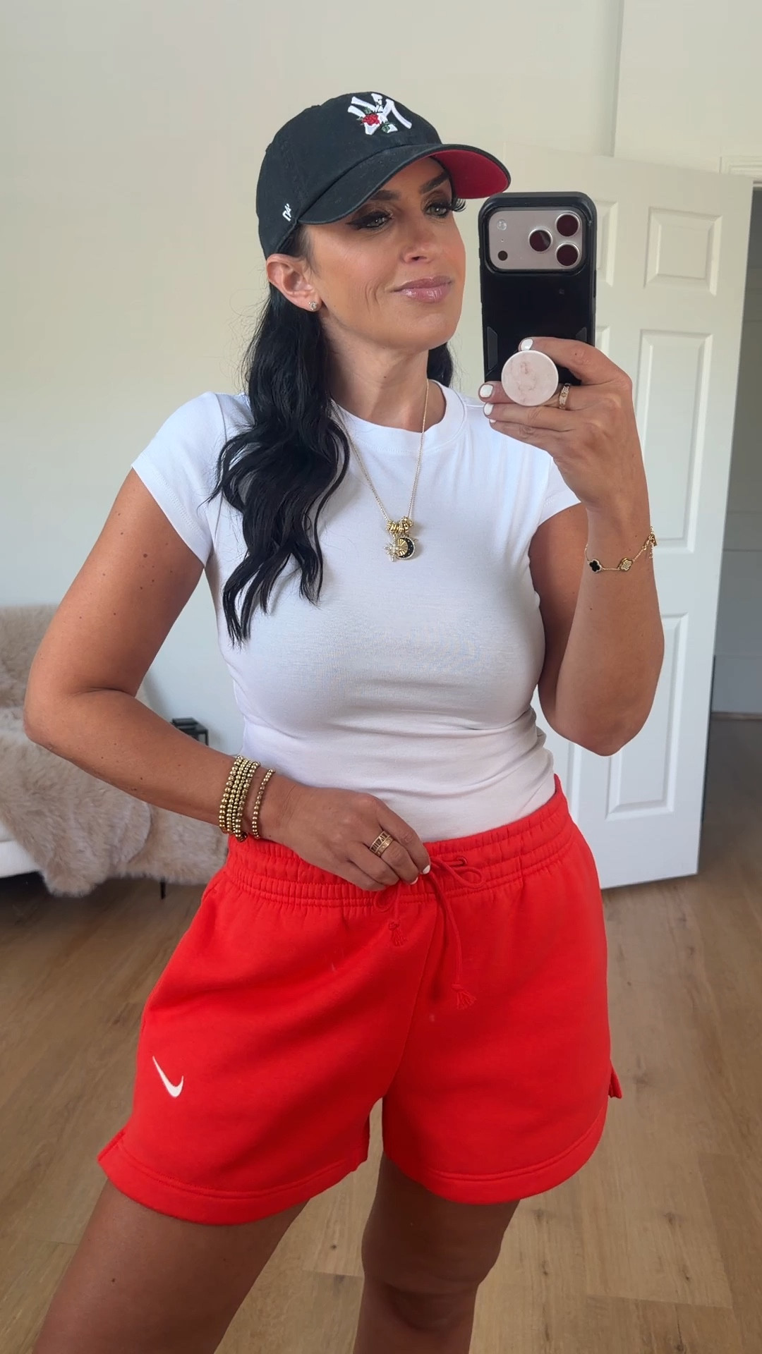 Nike sportswear phoenix fleece women’s red mid rise 4” shorts wearing size medium. Comes in over 10 colors 