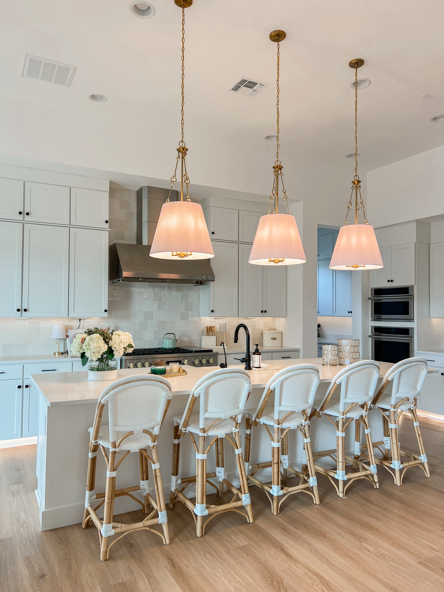 Check out our new kitchen pendant lights! I absolutely LOVE the chain details and add such charm. They are available in warm brass (which we chose), english bronze, and satin nickel. They’re available on several websites and I have them linked on the ones that usually have the best prices. I was shocked when I found them for $225 each! The chain length is 120 inches and they were really easy to hang. The shade dimensions are 18.13 x 18.13 x 14. 

🏷 Kitchen Pendants | Kitchen Decor | Transitional Style | Home Decor Blogger | Home Decor Ideas | Budget Friendly Decor | White Kitchen | Kitchen Backsplash 

#kitchenpendants #kitchenlighting #kitchendecorideas #homedecorblogger #homeblog #arizonablogger 

#LTKhome #LTKsalealert
