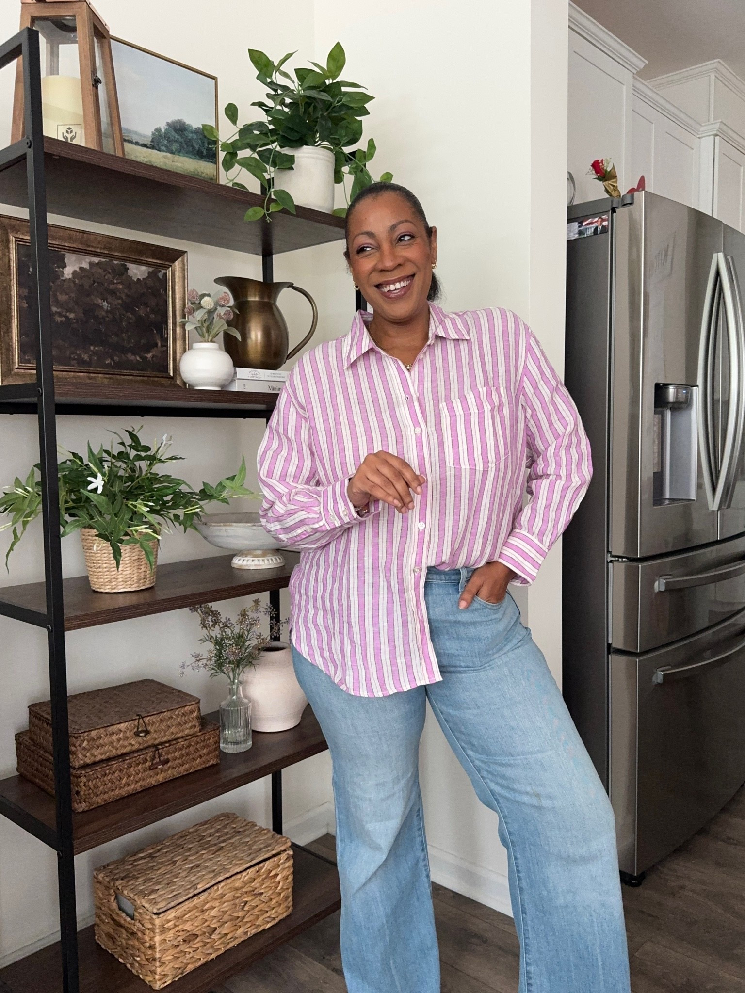 Pink striped linen shirt with light wash flare jeans

#LTKootd #LTKMidsize #LTKSaleAlert