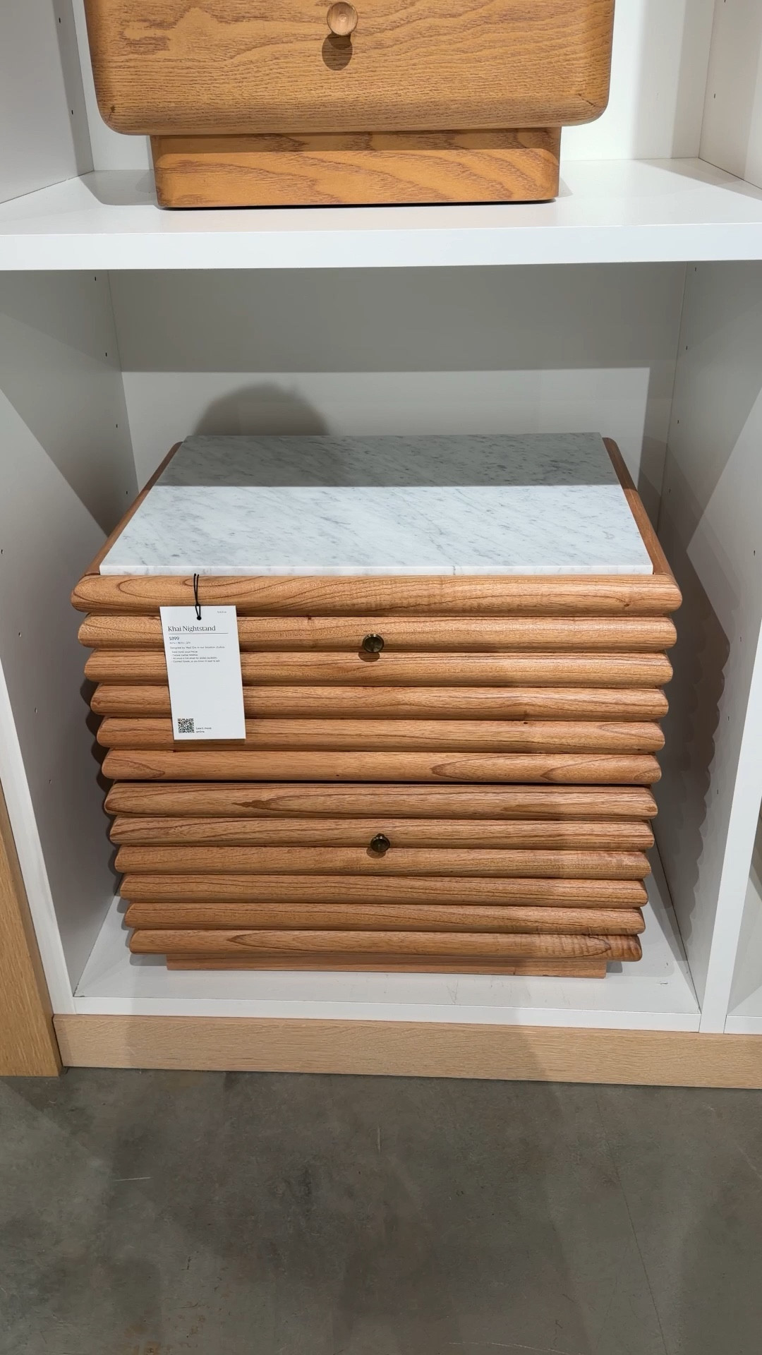 A beautiful blend of texture and contrast! 🤎✨ The Khai Marble Nightstand from West Elm pairs a sculptural ribbed wood frame with a crisp white Carrara marble top for a look that feels modern yet timeless. 🤍 The light brass knobs add a refined accent, while two drawers keep bedside essentials neatly tucked away. Such a stylish bedside piece that brings warmth, natural materials, and a little luxury to the bedroom. Linked this one and a few other beautiful nightstand options to shop! 🙌🏻 #WestElm #BedroomFurniture #Nightstand

#LTKSaleAlert #LTKHome