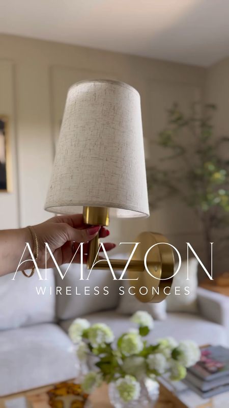 Amazon wireless rechargeable sconces in my lounge room! This holds a charge so well! Up to 50 hours when run on the lowest setting. And the antique brass finish is so pretty, does not feel cheap at all!

#LTKHome #LTKStyleTip #LTKSaleAlert