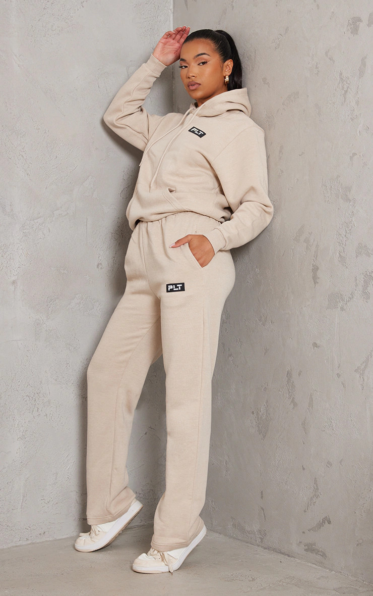 PRETTYLITTLETHING Sand Badge Detailed Straight Leg Sweatpants | PrettyLittleThing US