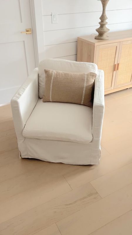 This slipcover swivel chair is under $250!!!  

#LTKhome #LTKstyletip