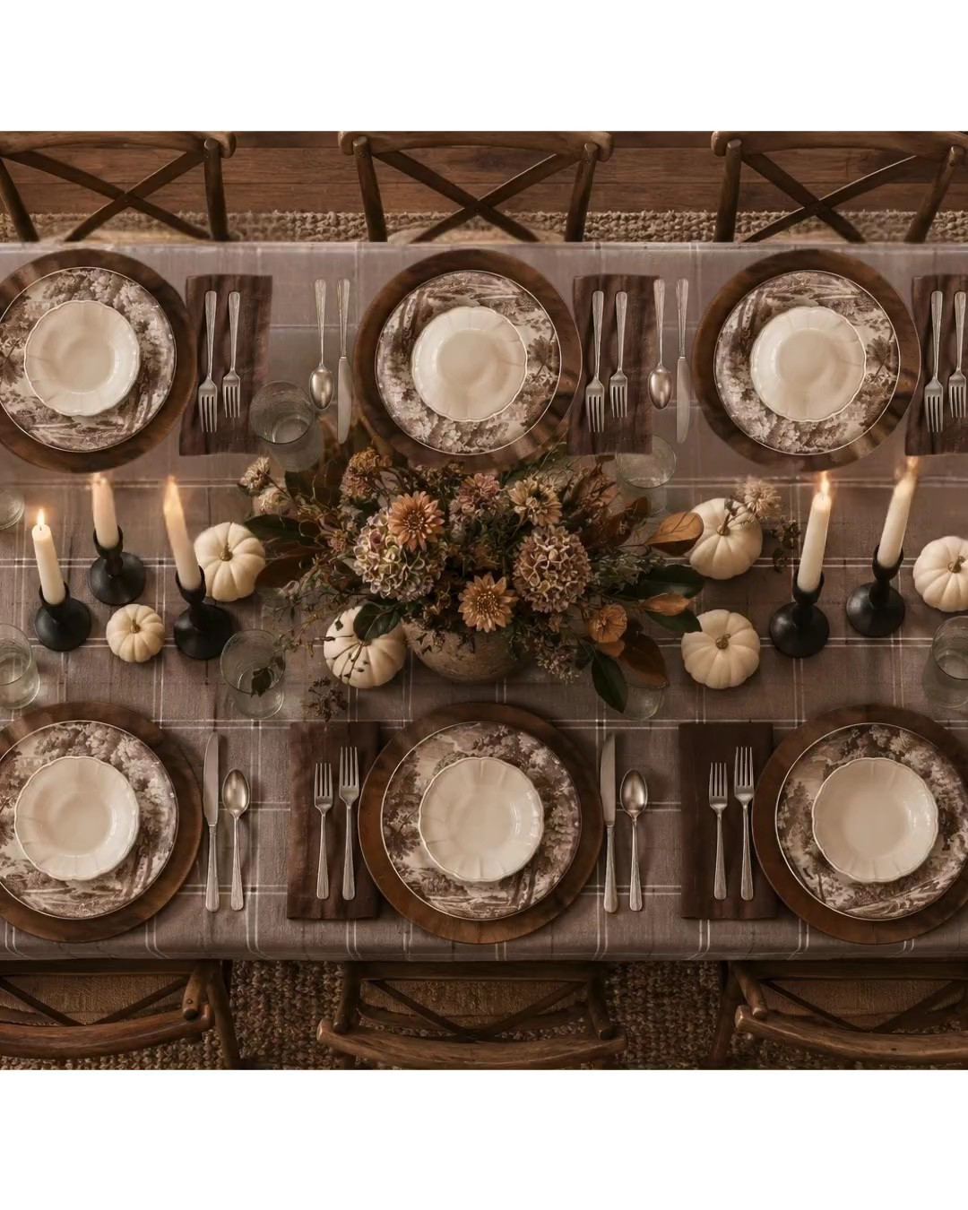 A neutral chic Thanksgiving table setting. Fall dining. Tablescape. Fall decor. Table centerpiece. Cream mini pumpkins. Toile brown dinner plates. Wood plate chargers. Fall floral centerpiece. Autumn. Black taper candlesticks. Serveware. Plaid tablecloth. Brown glass vase. Home decor. Styling tip. 

 #LTKSeasonal #LTKHome #LTKSaleAlert