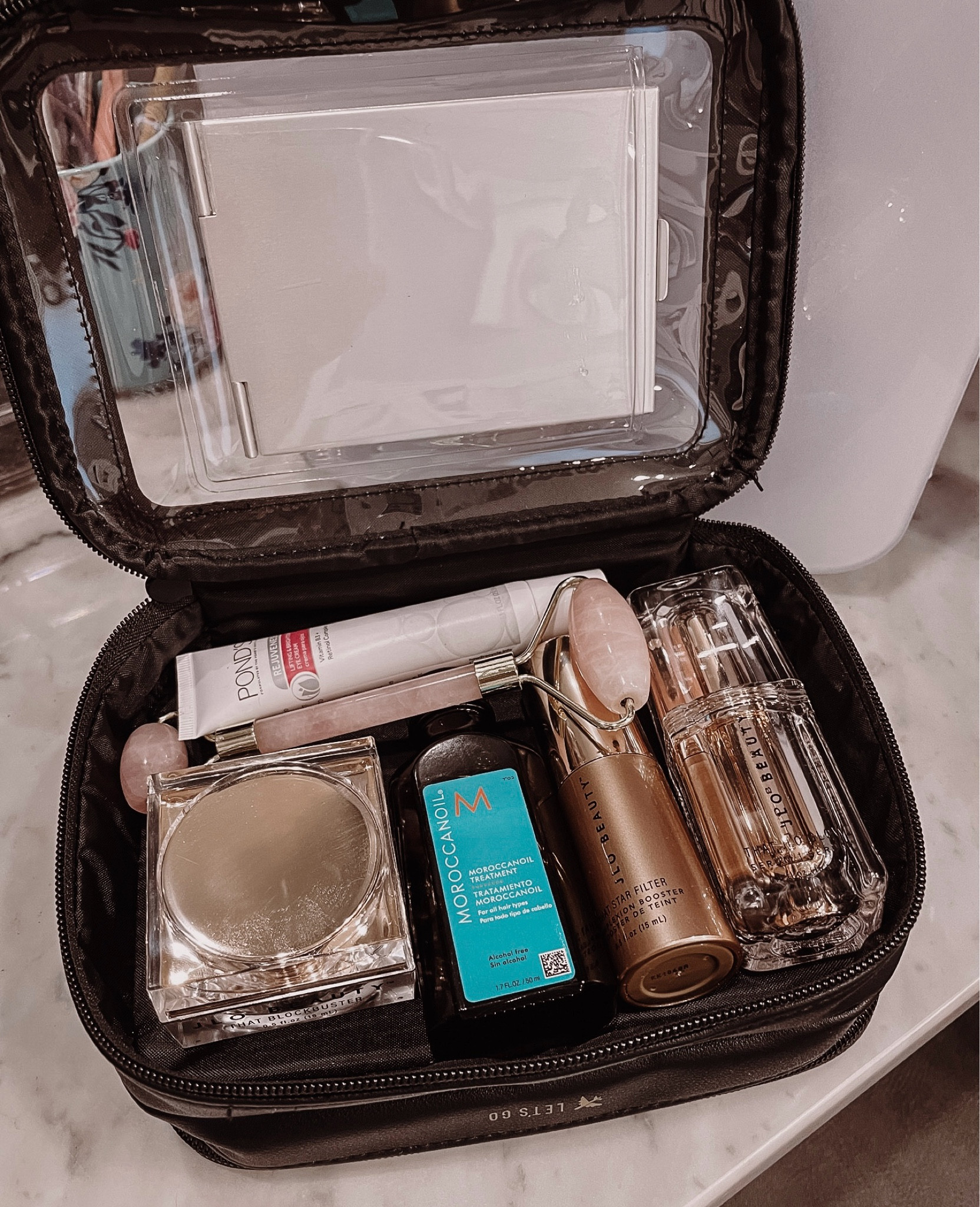 Some of my favorite travel goodies include the JLO skin glow set, Moroccan Oil (because Italian hair), Sol De Janiero Bum Bum cream & a few others. They all fit perfect into my Beis clear travel case so I know exactly what I have & where it is. It’s double sided so it holds a ton & even comes with its own travel mirror. ♥️

#LTKTravel #LTKOver40 #LTKFindsUnder50