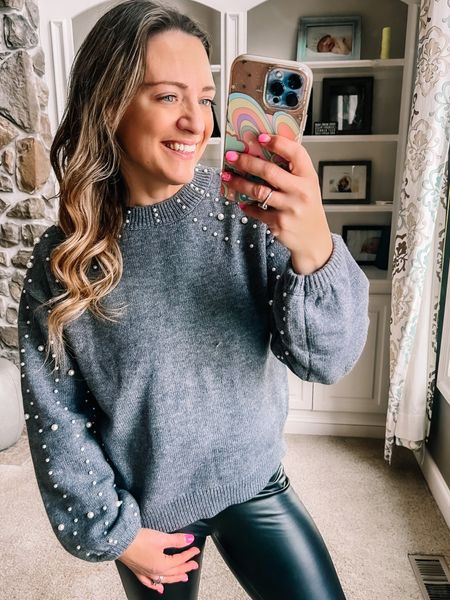 Loving this pearl embellished sweater, on sale for just $19.99! Looks great with faux leather leggings! Winter outfit • date night look • beaded sweater • sweater sale 

#LTKfindsunder50 #LTKover40 #LTKsalealert