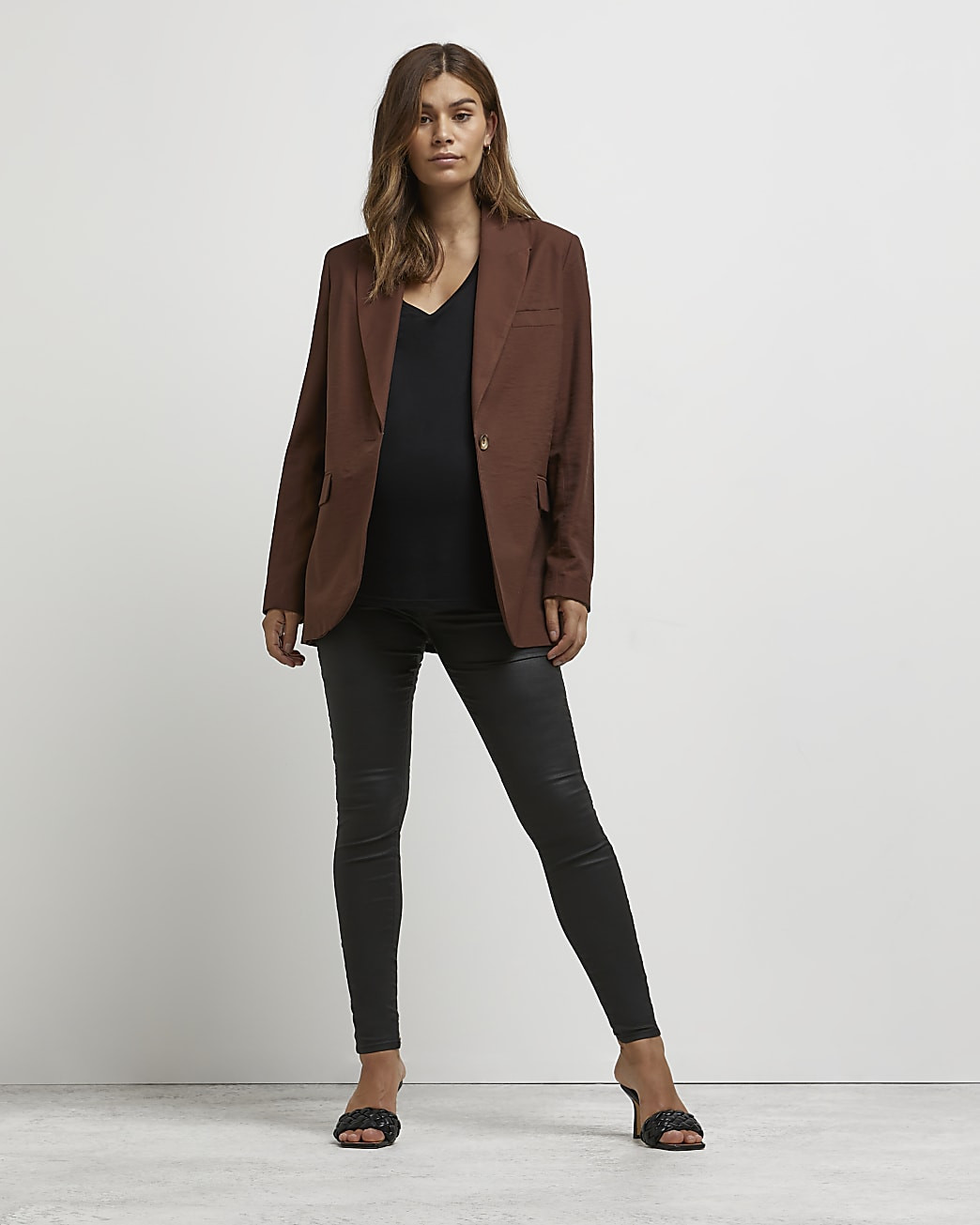 Black Molly coated maternity skinny jeans | River Island (US)