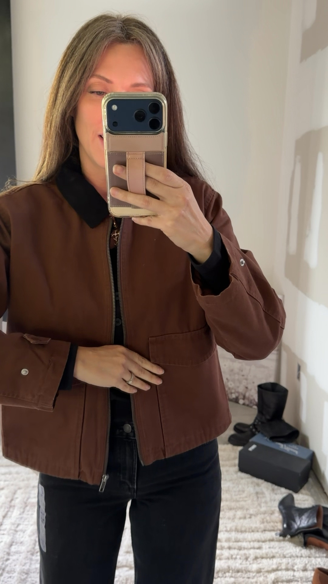 Wearing the small jacket