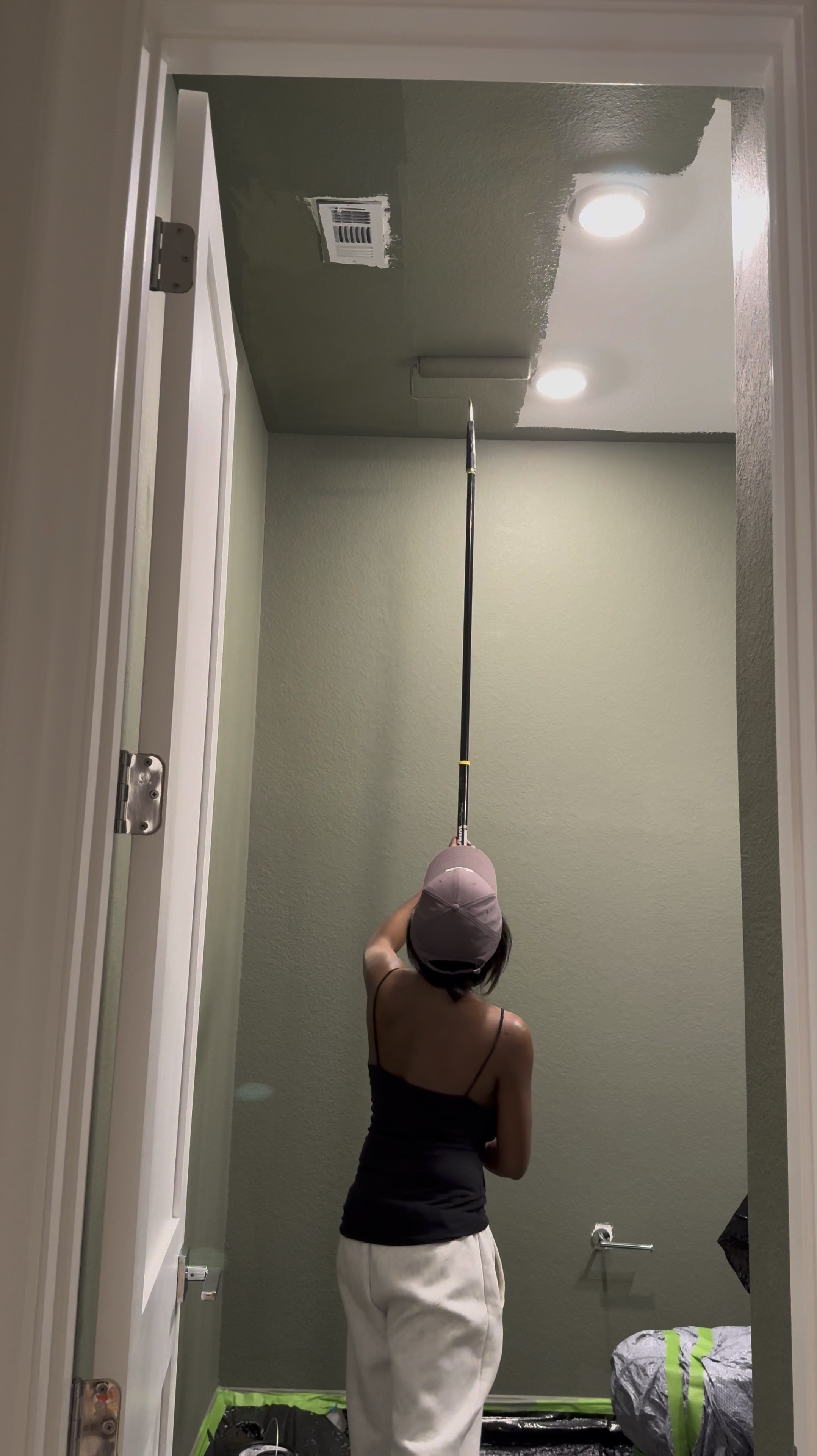 Comment: Bathroom

If you’re considering painting your powder room green, I’m telling you, THIS might be the perfect color for you … go for it! 

I used flat finish for the walls and painted the baseboards in satin finish… 

I’ll be honest, I was apprehensive at first … I even paintings the ceiling 😬 believe it our not, it made the room feel larger! 

I chose brass finishes bc I really wanted the space to have a vintage feel… well, modern vintage…??? If that’s a thing 😆.. 

The mirror is 30x40 inches… 

I added a new light fixture and it now faces upwards … which made that wall feel taller 

I wasn’t in love with this builder grade vanity tbh😆, matter-fact, I wanted to change it… it wasn’t functional …but now i wanna keep it lol 😂… I added brass hardware, these cute baskets from Walmart, led light strips on the bottom and now it’s a whole new unit….. you can even add battery powered/rechargeable/plug in led light strips .. whatever fits your lifestyle 

Ok let’s talk about this stunning planter!!! …. You know I love me an olive tree 😆… and I wanted something tell and slim… this planter was the perfect for plus it added to the moodiness 🥰

I am in love with this space… I wanted to create a vintage-cottagy feel in this powder room, while the rest of the home feels modern. 

#LTKhome #LTKstyletip 

#LTKVideo