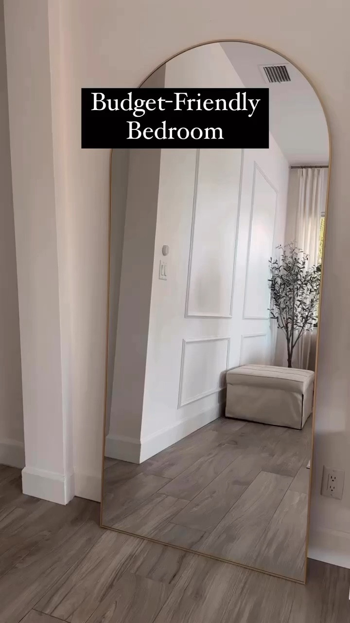 This mirror is so beautiful and definitely elevates the decor of your room. It is an affordable item to add to your room decor.
I am loving my budget-friendly bedroom makeover. 
Bedroom organizing
Beautiful olive tree from Target
Amazon Ottoman that turns into a single bed
Walmart carpet/rug
Amazon lamps
Mirror from Amazon
Wayfair bedframe
Bedroom Re-do on a budget
Etsy wall frame

#LTKU #LTKfindsunder100 #LTKhome